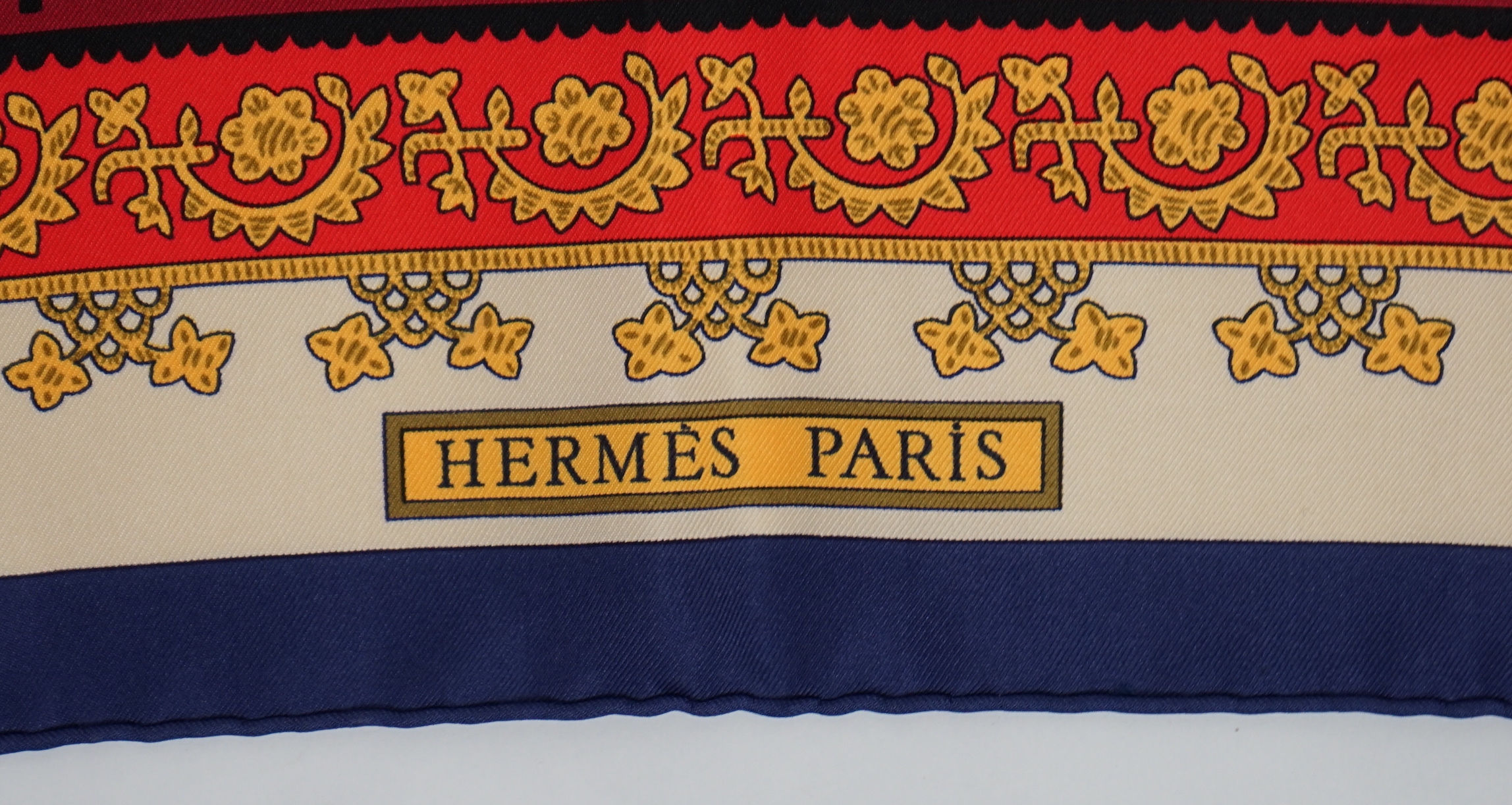 A Hermès Brins D'or silk scarf by Julia Abadie, 90cm x 90cm